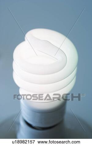 Close up of energy efficient light bulb View Large Photo Image Stock Photo - Close up of energy efficient light bulb. Fotosearch