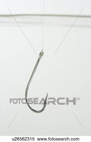 Stock Photography - Close up of fish hook in water. Fotosearch
