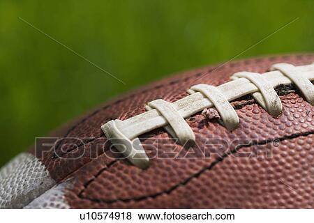 Stock Photo - Close up of football stitching. Fotosearch