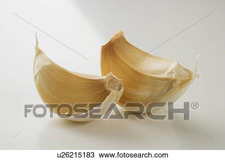Stock Image - Close up of garlic cloves. Fotosearch