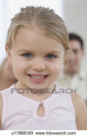 Stock Image - Close up of girl smiling. Fotosearch