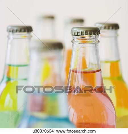 Close up of glass soda bottles View Large Photo Image Picture - Close up of glass soda bottles. Fotosearch
