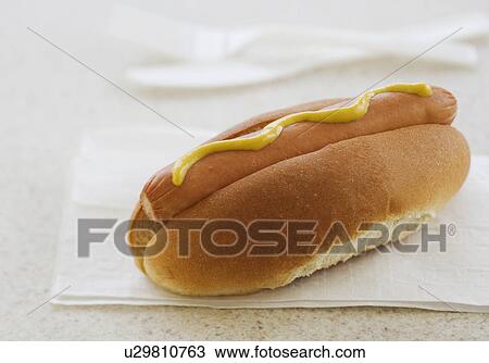 Close up of hot dog in bun View Large Photo Image Stock Image - Close up of hot dog in bun. Fotosearch