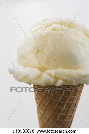 Stock Photo - Close up of ice cream cone. Fotosearch