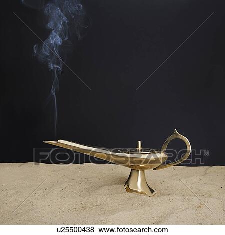 Close up of incense burner on sand View Large Photo Image Stock Photo - Close up of incense burner on sand. Fotosearch