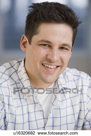 Close up of man smiling View Large Photo Image Stock Image - Close up of man smiling. Fotosearch