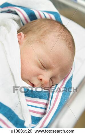 Close up of newborn baby sleeping View Large Photo Image Stock Image - Close up of newborn baby sleeping. Fotosearch