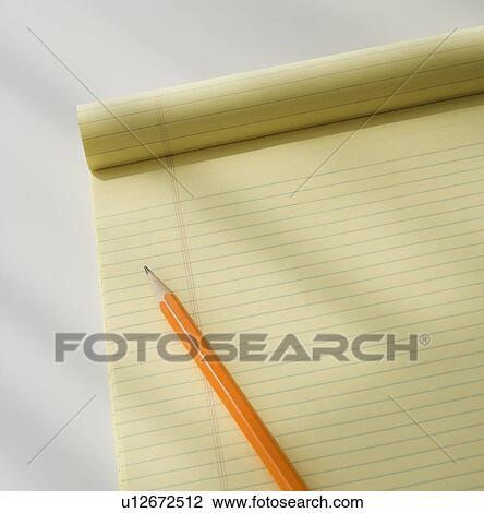 Close up of notepad and pencil View Large Photo Image Stock Image - Close up of notepad and pencil. Fotosearch