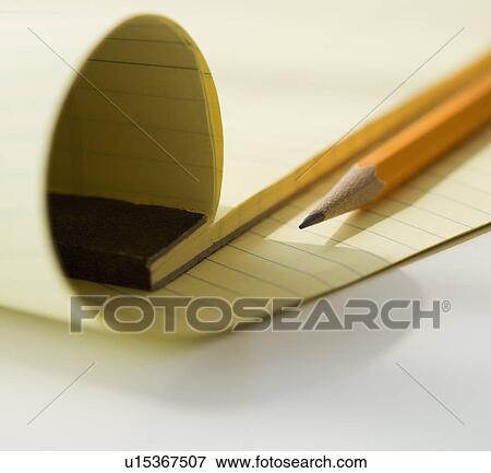 Close up of notepad and pencil View Large Photo Image Stock Photo - Close up of notepad and pencil. Fotosearch