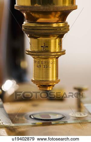 Close up of old fashioned microscope View Large Photo Image Stock Photo - Close up of old fashioned microscope. Fotosearch