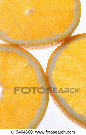 Stock Image - Close up of orange slices. Fotosearch