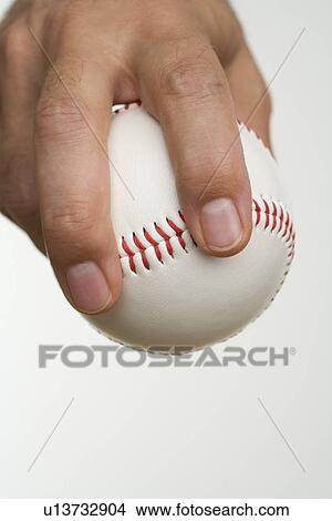 Close up of pitcher holding baseball View Large Photo Image Picture - Close up of pitcher holding baseball. Fotosearch