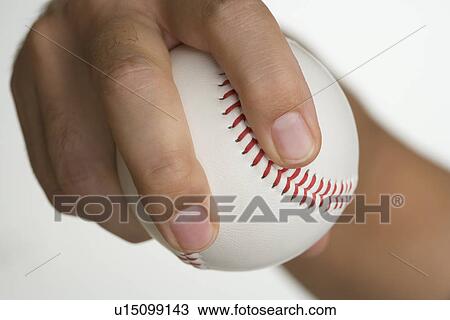Close up of pitcher holding baseball View Large Photo Image Stock Image - Close up of pitcher holding baseball. Fotosearch