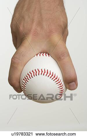 Close up of pitcher holding baseball View Large Photo Image Stock Image - Close up of pitcher holding baseball. Fotosearch