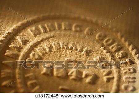 Stock Photography - Close up of raised corporate seal. Fotosearch