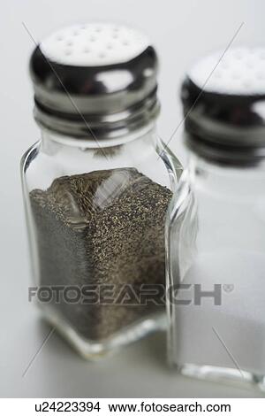 Close up of salt and pepper shakers View Large Photo Image Picture - Close up of salt and pepper shakers. Fotosearch