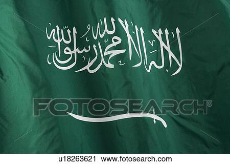 Stock Image - Close up of Saudi Arabian flag. Fotosearch