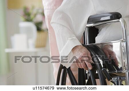 Close up of senior adult in wheelchair View Large Photo Image Stock Photo - Close up of senior adult in wheelchair. Fotosearch