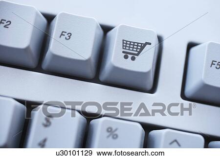 Close up of shopping cart button on keyboard View Large Photo Image Stock Photo - Close up of shopping cart button on keyboard. Fotosearch