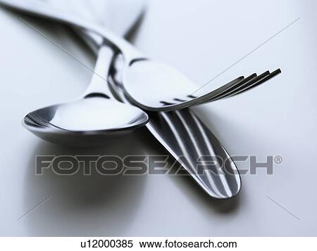 Close up of silverware on table View Large Photo Image Stock Photography - Close up of silverware on table. Fotosearch