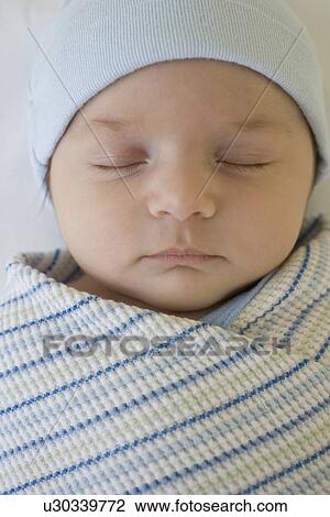 Stock Image - Close up of sleeping baby. Fotosearch