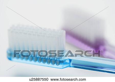 Close up of toothbrushes View Large Photo Image Stock Image - Close up of toothbrushes. Fotosearch
