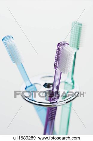 Close up of toothbrushes View Large Photo Image Stock Photo - Close up of toothbrushes. Fotosearch
