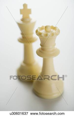 Close up of white chess pieces View Large Photo Image Stock Photo - Close up of white chess pieces. Fotosearch
