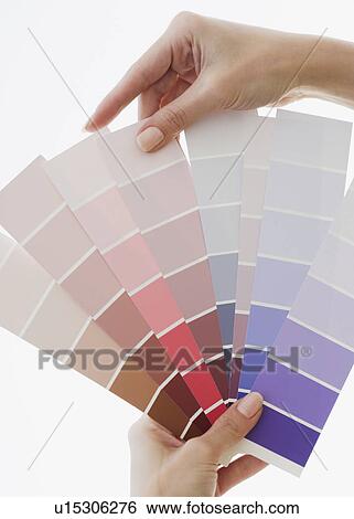 Close up of woman comparing paint swatches View Large Photo Image Stock Photograph - Close up of woman comparing paint swatches. Fotosearch