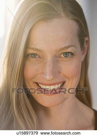 Stock Photo - Close up of woman smiling. Fotosearch