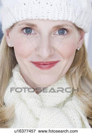 Close up of woman wearing hat and scarf View Large Photo Image Stock Photo - Close up of woman wearing hat and scarf. Fotosearch