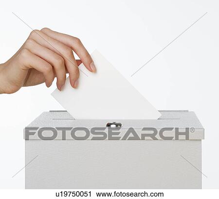 Close up of woman's hand putting card in box with slot View Large Photo Image Stock Image - Close up of woman's hand putting card in box with slot. Fotosearch