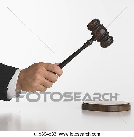 Close up studio shot of judge's hand with gavel View Large Photo Image Stock Image - Close up studio shot of judge's hand with gavel. Fotosearch