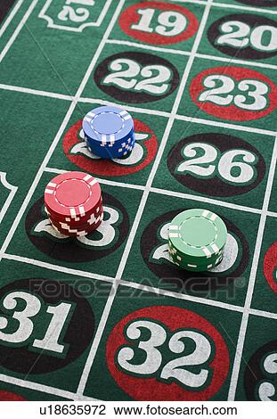 Stock Image - Closeup of wagers on gaming table. Fotosearch