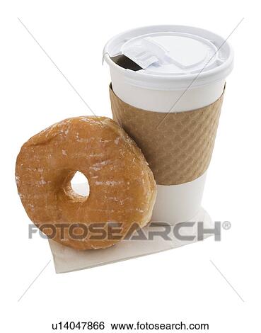 Stock Photograph - Coffee in to go cup next to doughnut. Fotosearch