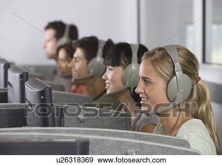 College students wearing headsets in computer lab View Large Photo Image Stock Photo - College students wearing headsets in computer lab. Fotosearch