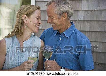 Couple drinking wine View Large Photo Image Stock Image - Couple drinking wine. Fotosearch