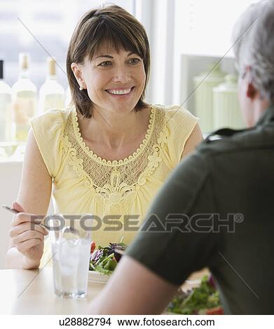 Couple eating salad View Large Photo Image Picture - Couple eating salad. Fotosearch