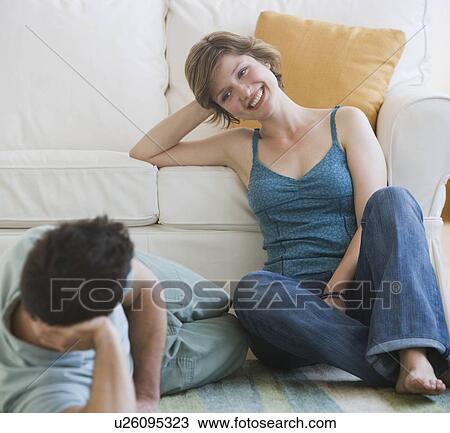 Stock Image - Couple smiling at each other. Fotosearch