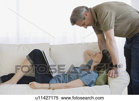 Couple smiling at each other View Large Photo Image Stock Photography - Couple smiling at each other. Fotosearch
