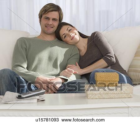 Couple watching television View Large Photo Image Stock Image - Couple watching television. Fotosearch