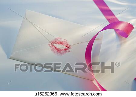 Stock Photograph - Envelope with lipstick kiss. Fotosearch