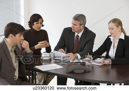 Group of businesspeople in meeting View Large Photo Image Stock Image - Group of businesspeople in meeting. Fotosearch