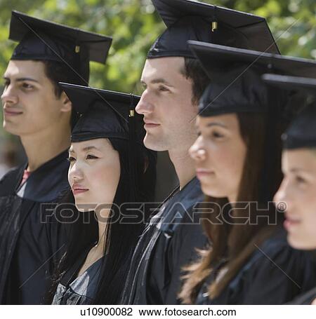Stock Image - Group of college graduates in row. Fotosearch