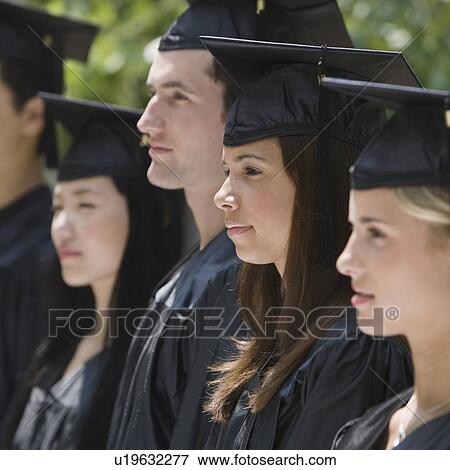 Stock Photo - Group of college graduates in row. Fotosearch