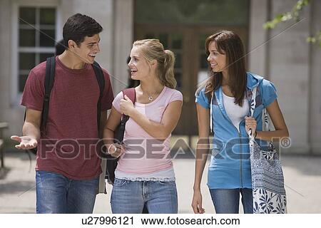 Stock Image - Group of college students talking. Fotosearch