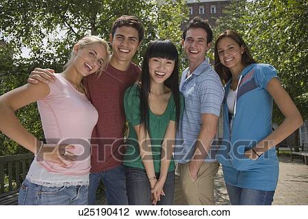 Group of multi-ethnic young adults View Large Photo Image Stock Image - Group of multi-ethnic young adults. Fotosearch