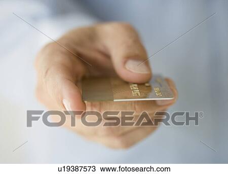 Hand holding credit card View Large Photo Image Stock Image - Hand holding credit card. Fotosearch