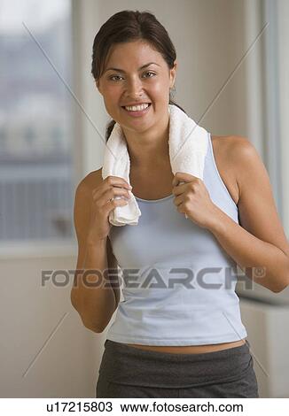 Stock Image - Hispanic woman in sportswear. Fotosearch