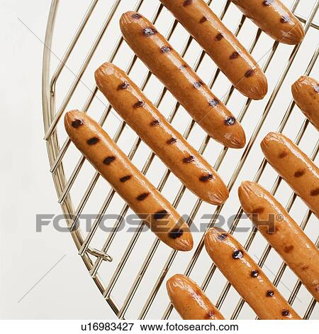 Hot dogs on grill View Large Photo Image Stock Photo - Hot dogs on grill. Fotosearch